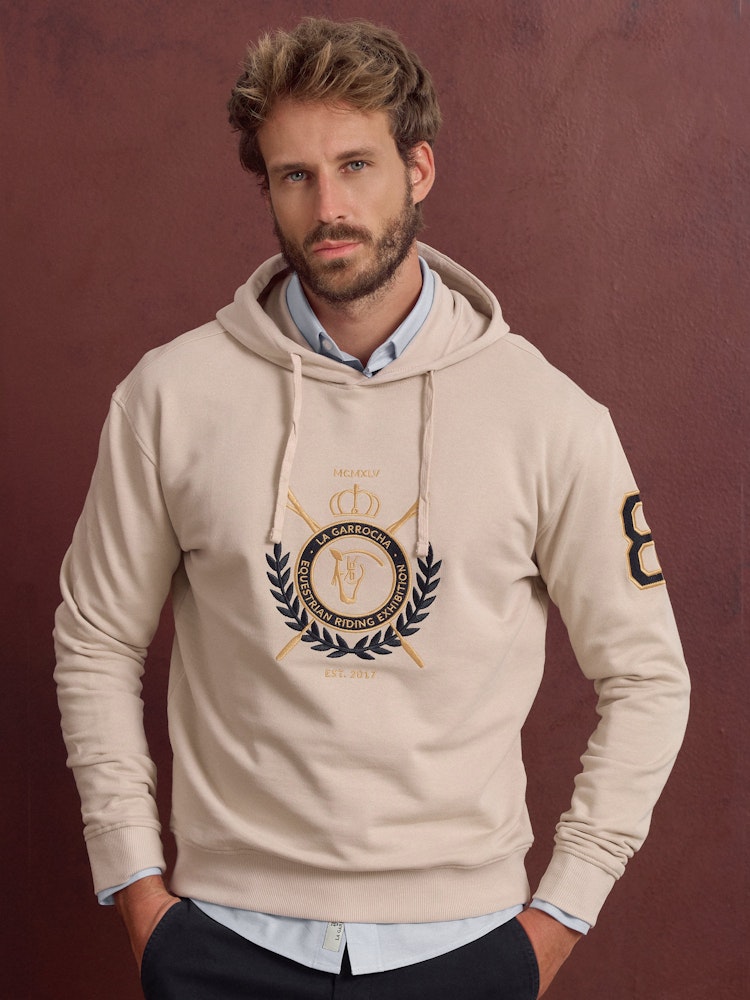 Sudadera Capucha Escudo Nude de hombre La Garrocha